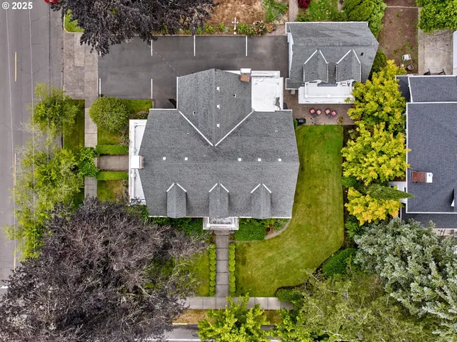 an aerial view of a house with a garden