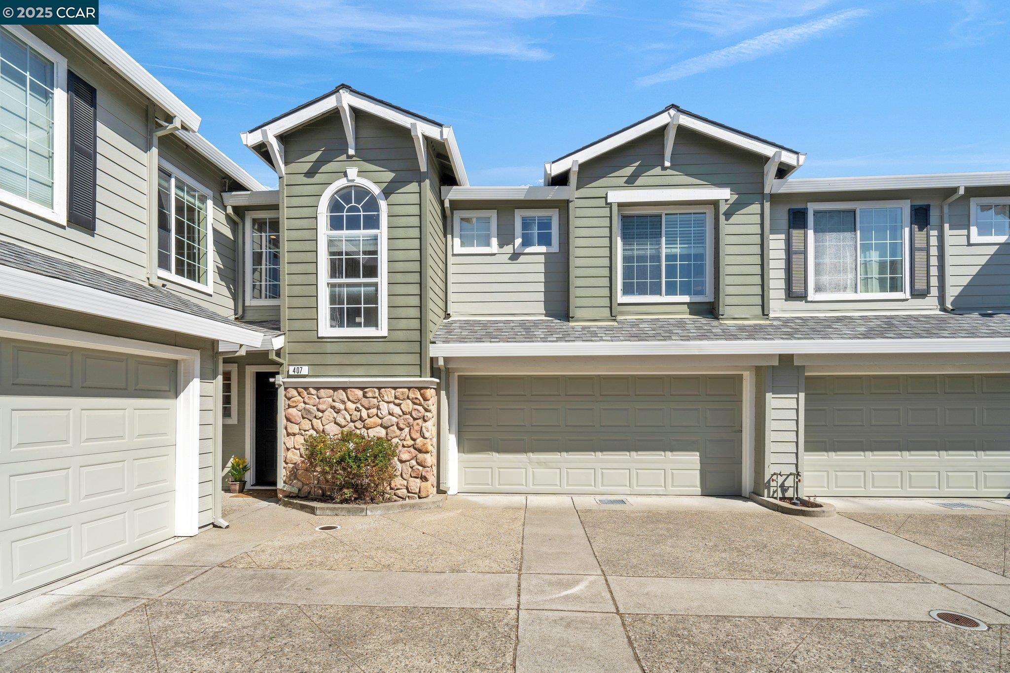 407 Daybreak Court San Ramon, CA 94583 - Photo 1 of 1 a front view of a house with a yard and garage
