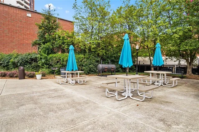 a view of a park with swings and slides