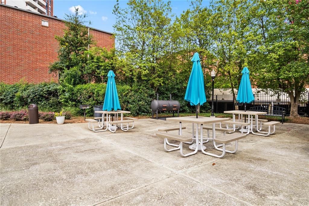 375 Ralph McGill Boulevard Northeast, Unit 1402 Atlanta, GA 30312 - Photo 16 of 17 a view of a park with swings and slides