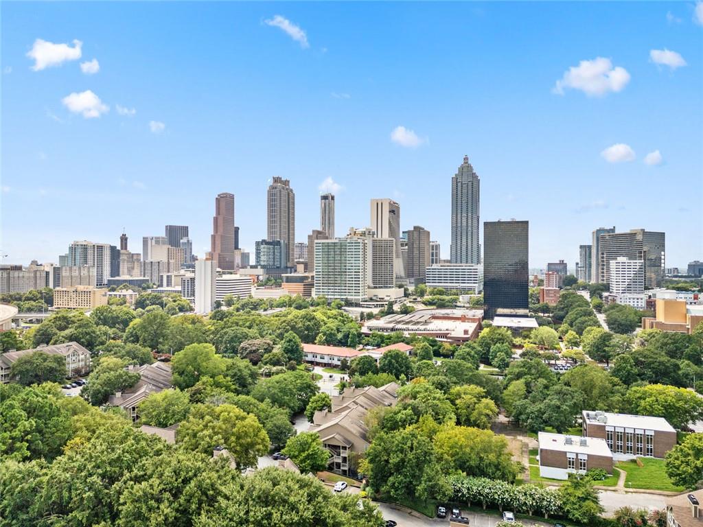 375 Ralph McGill Boulevard Northeast, Unit 1402 Atlanta, GA 30312 - Photo 2 of 17 a view of a city with tall buildings