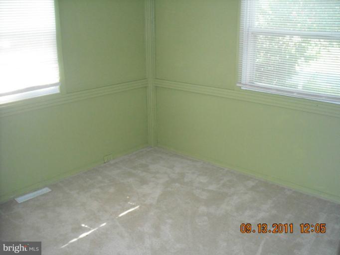 1315 4th Road Middle River, MD 21220 - Photo 3 of 8 a view of a small space with a window