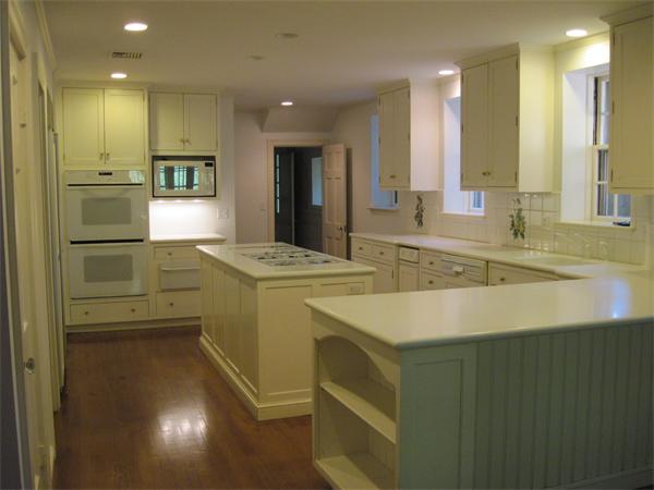 90 Sargent Road Brookline, MA 02445 - Photo 6 of 9 a kitchen with a sink counter top space and stainless steel appliances