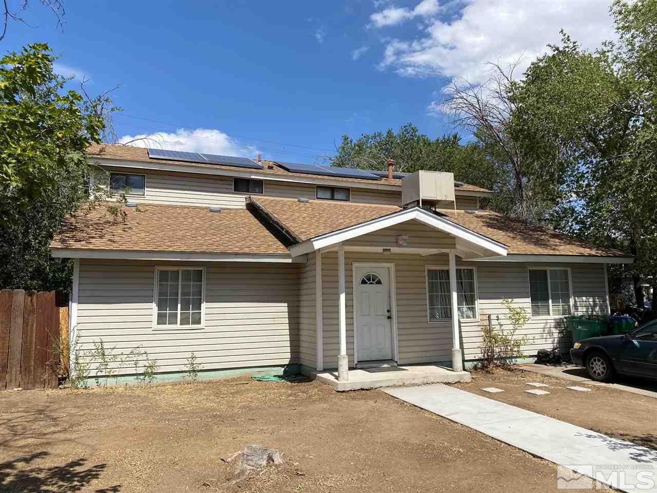 1885 Wilder Street Reno, NV 89512 - Photo 13 of 19 a front view of a house with a garage