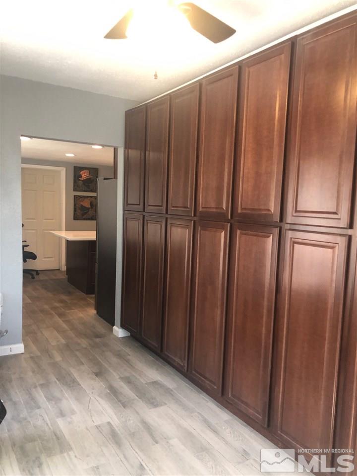 1885 Wilder Street Reno, NV 89512 - Photo 2 of 19 a view of an empty room with wooden floor