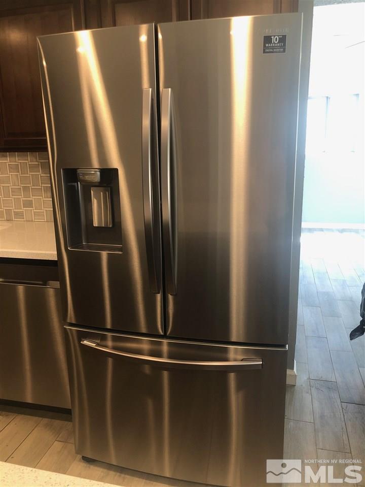 1885 Wilder Street Reno, NV 89512 - Photo 6 of 19 a view of a refrigerator in kitchen