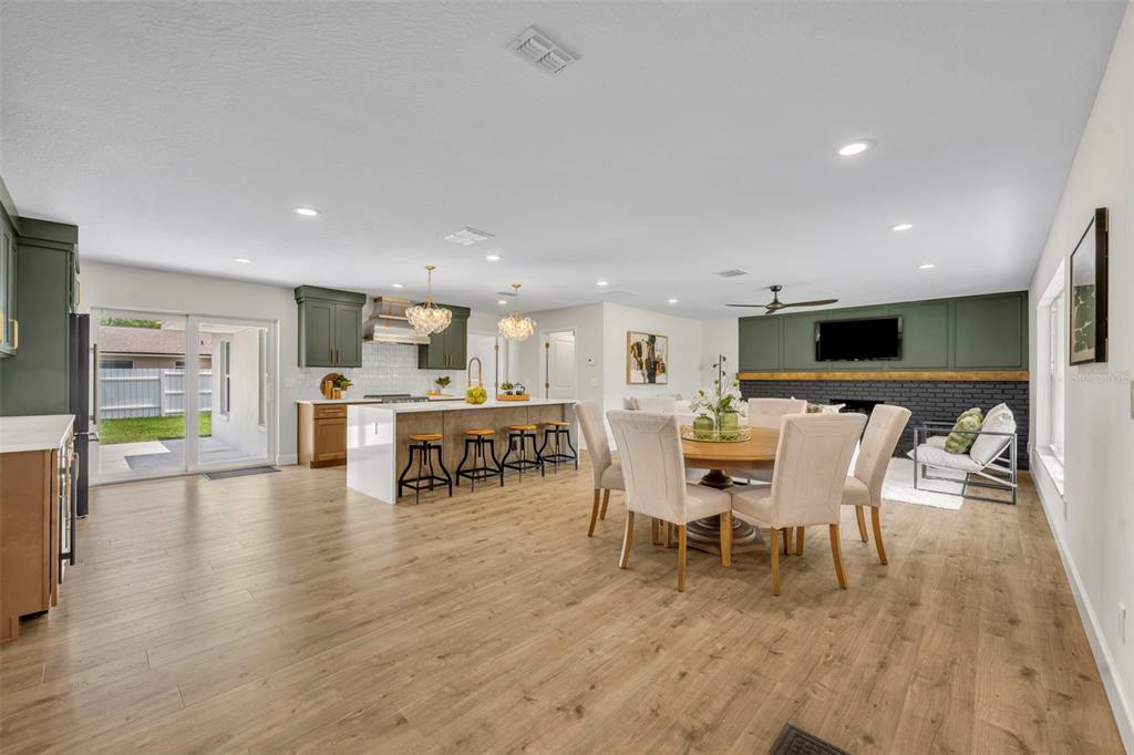 350 Cornwall Road Winter Park, FL 32792 - Photo 9 of 36 a dining room with furniture and wooden floor