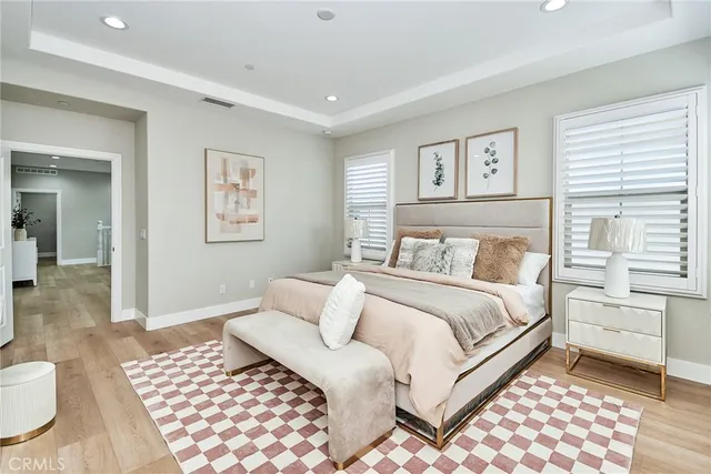 a bedroom with a bed and a view of bathroom