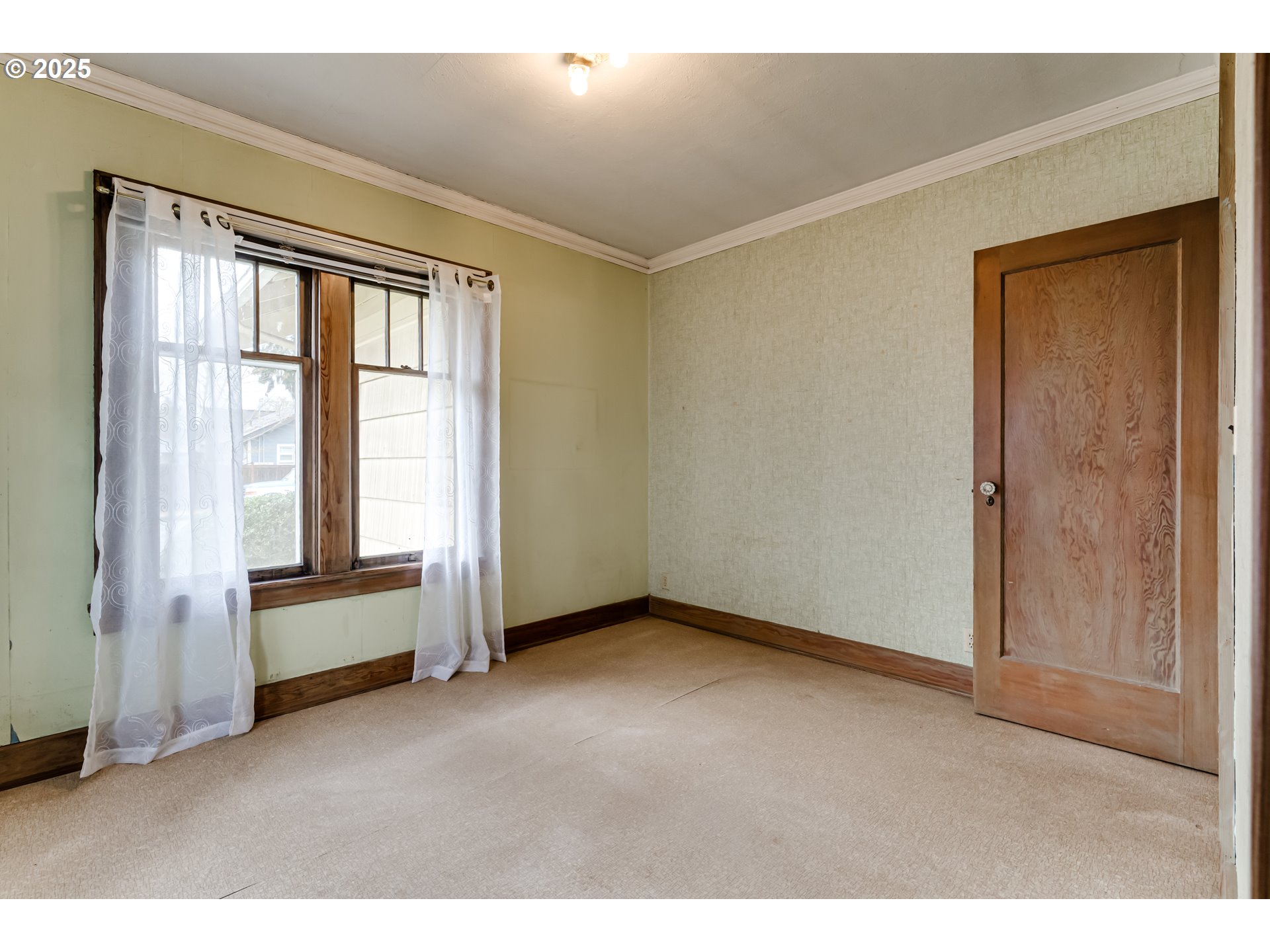 835 Maple Street Junction City, OR 97448 - Photo 17 of 29 a view of an empty room with a window