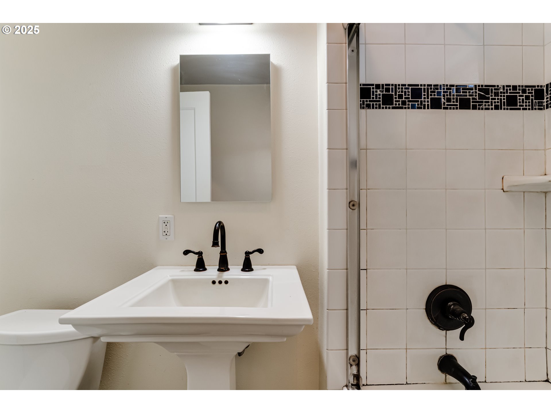 835 Maple Street Junction City, OR 97448 - Photo 19 of 29 a bathroom with a sink and a mirror