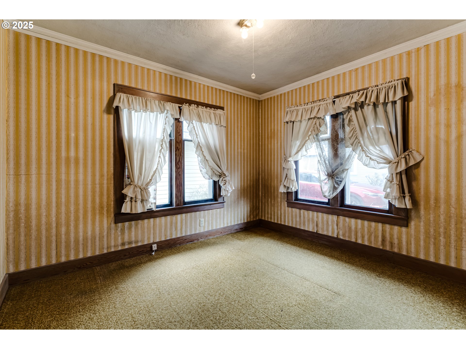 835 Maple Street Junction City, OR 97448 - Photo 20 of 29 a view of an empty room with wooden floor and a window