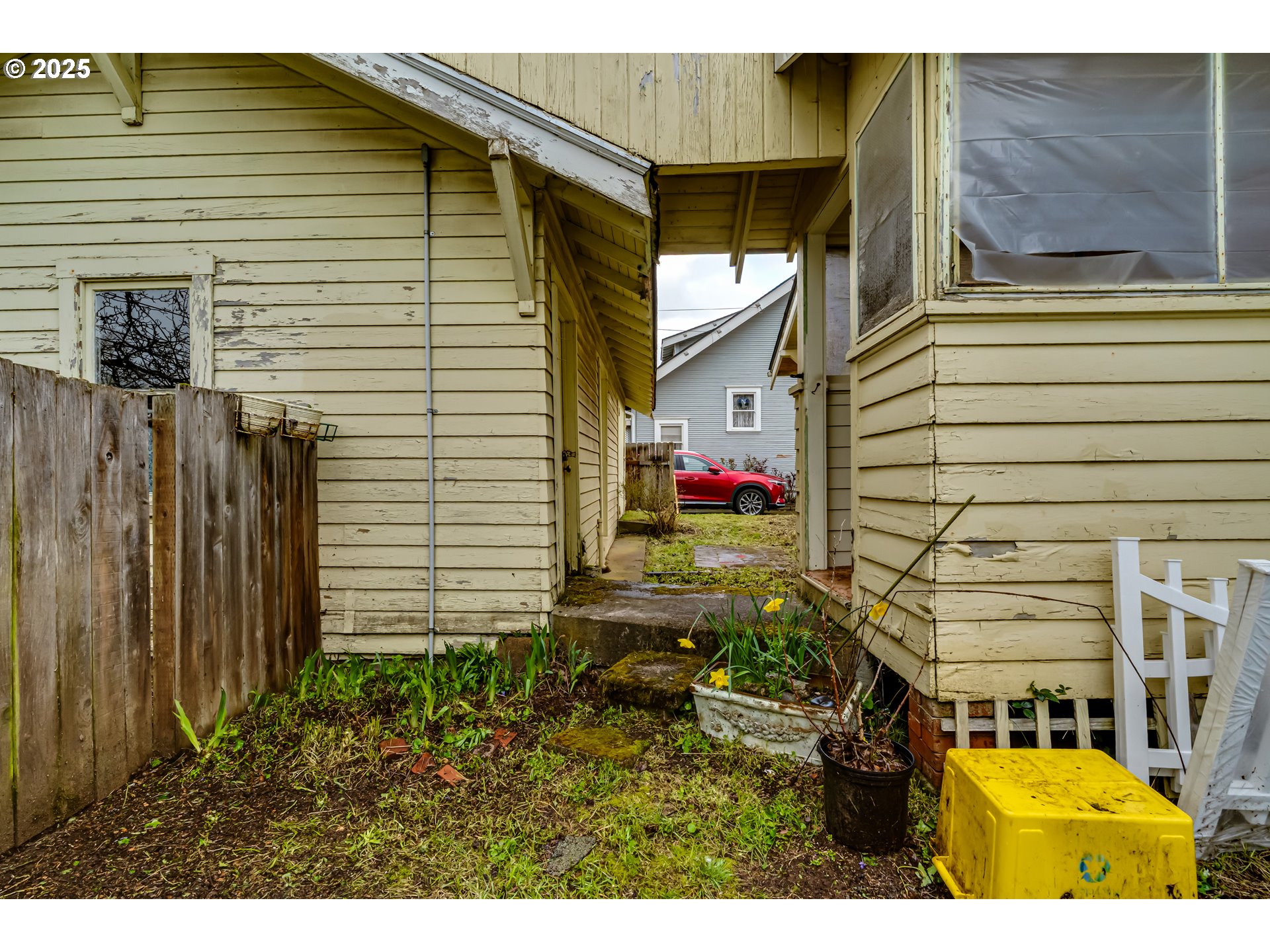 835 Maple Street Junction City, OR 97448 - Photo 25 of 29 a view of a house with a small yard and potted plants