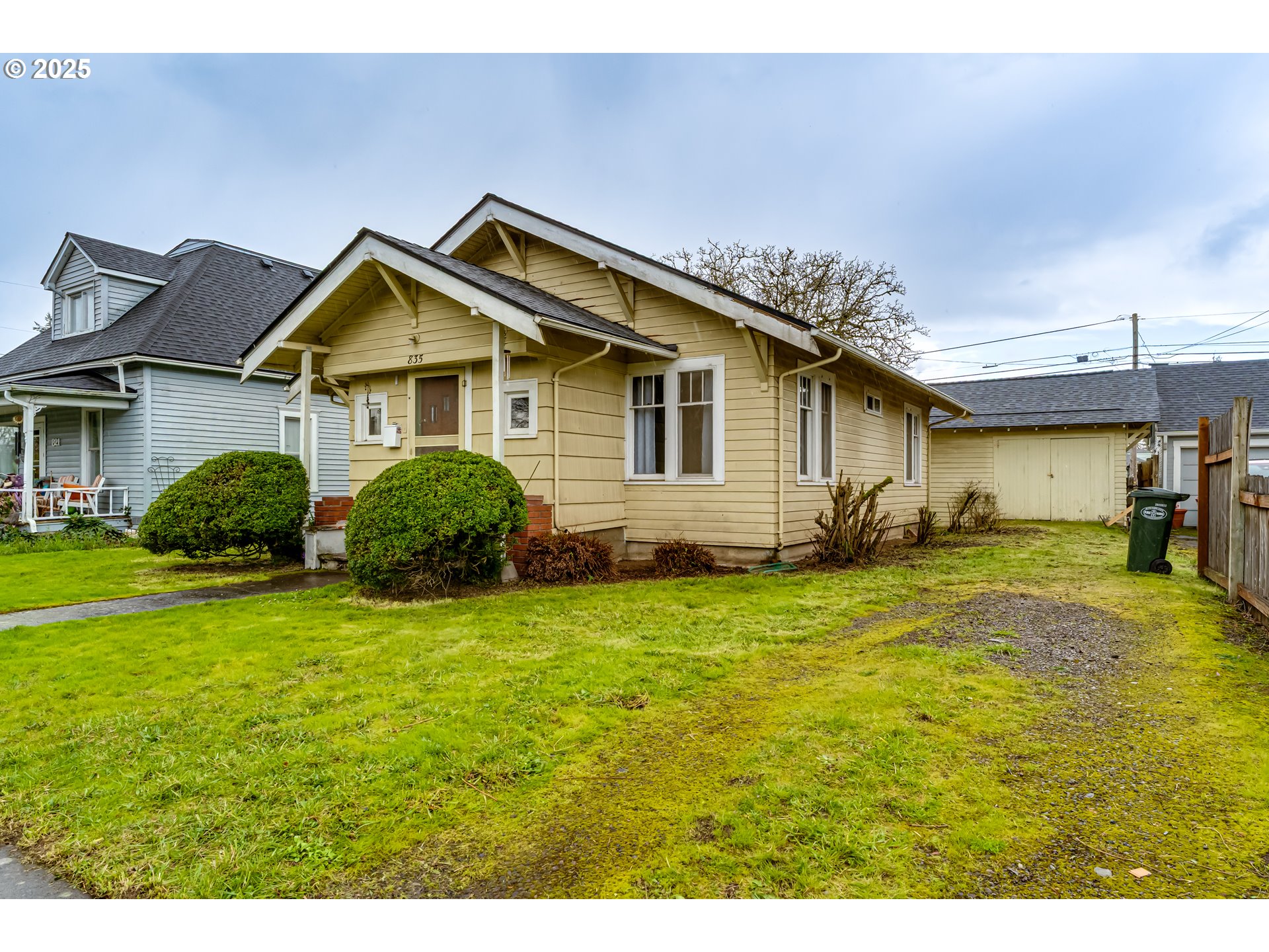 835 Maple Street Junction City, OR 97448 - Photo 3 of 29 a view of a yard in front of a house with a small yard