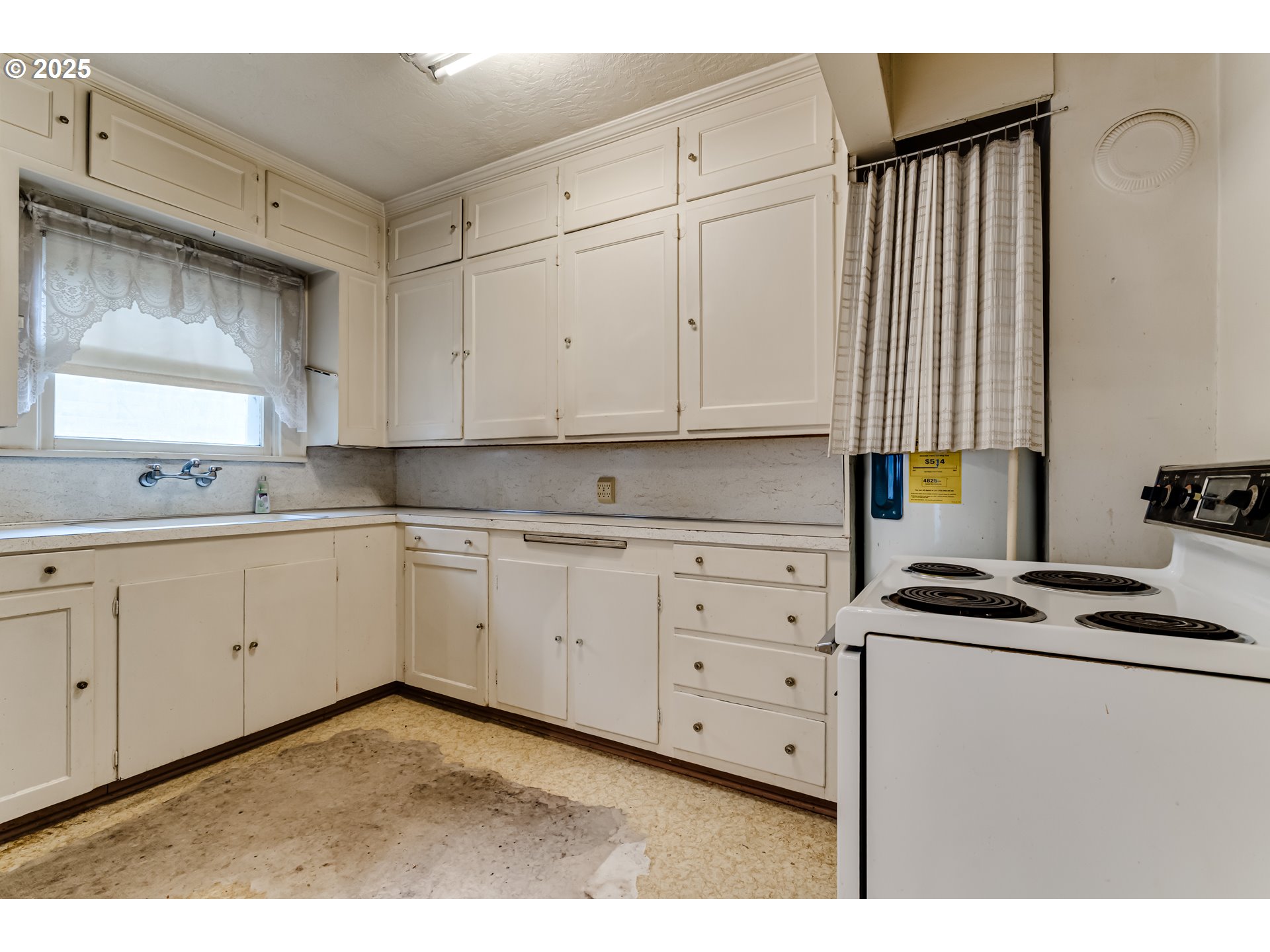 835 Maple Street Junction City, OR 97448 - Photo 10 of 29 a kitchen with appliances cabinets and a sink