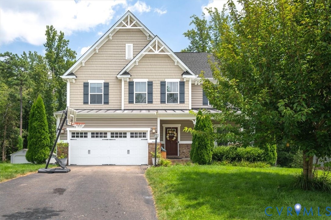 9013 Bailey Hill Road Midlothian, VA 23112 - Photo 2 of 56 Traditional-style home featuring a two-car garage