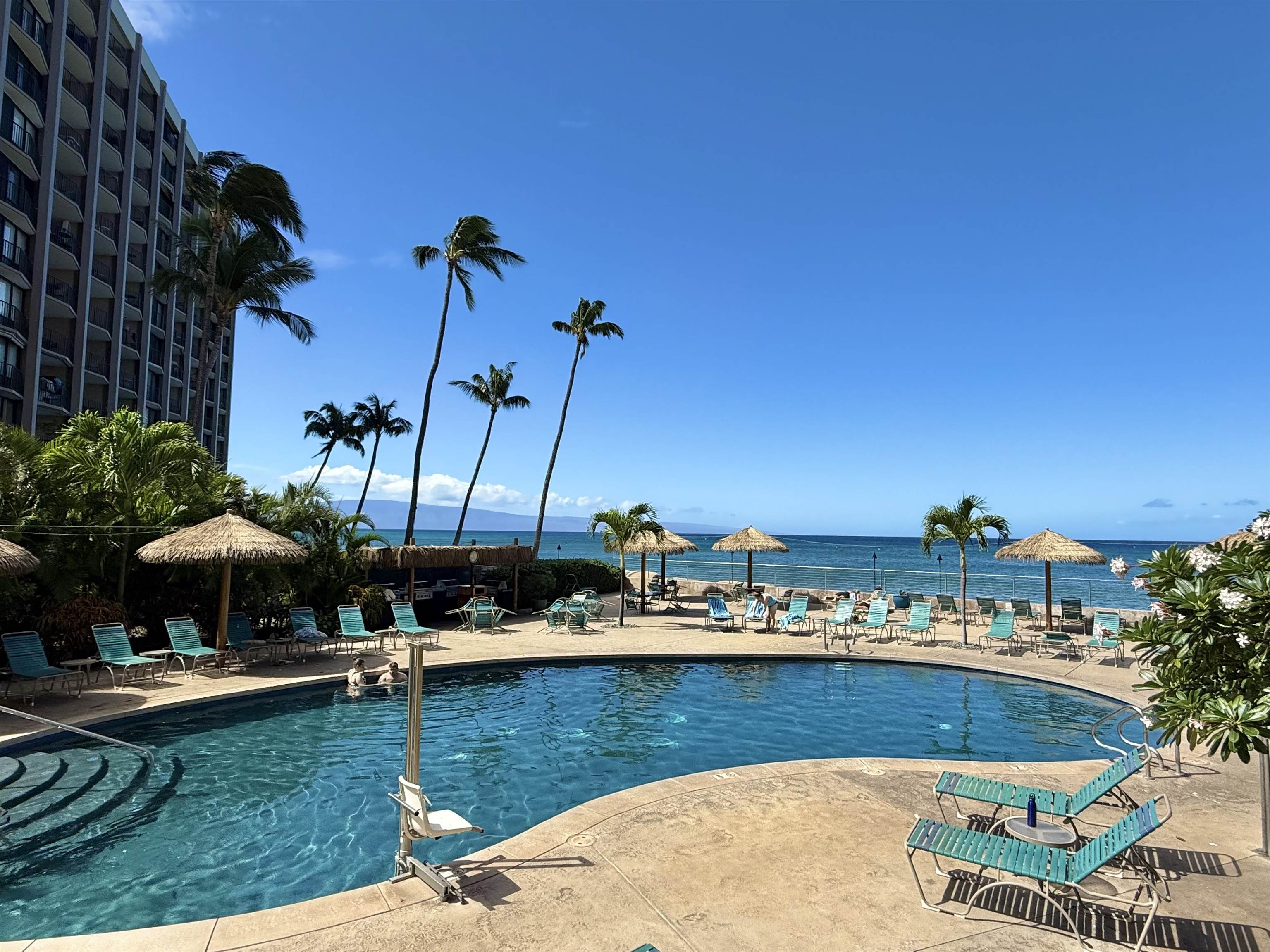 4365 Lower Honoapiilani Road, Unit 801 Lahaina, HI 96761 - Photo 20 of 24 a view of swimming pool with outdoor seating