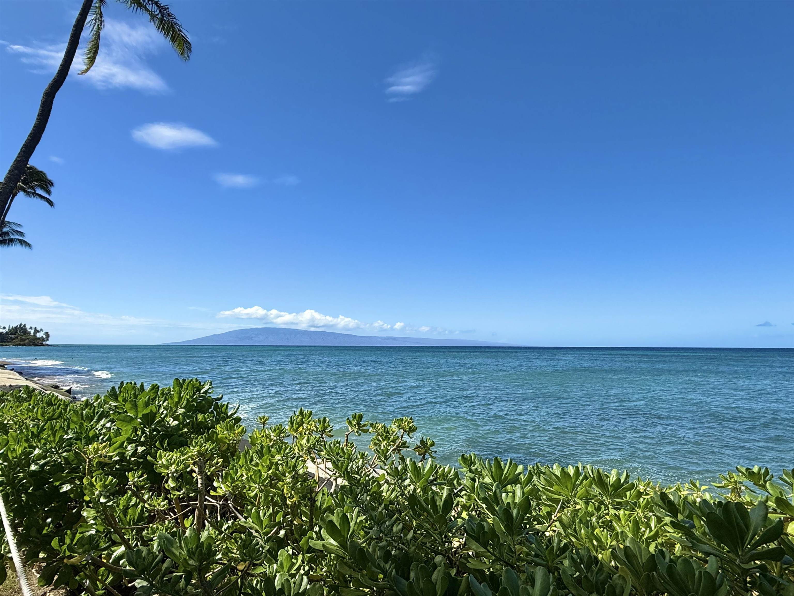 4365 Lower Honoapiilani Road, Unit 801 Lahaina, HI 96761 - Photo 22 of 24 a view of an ocean from a yard