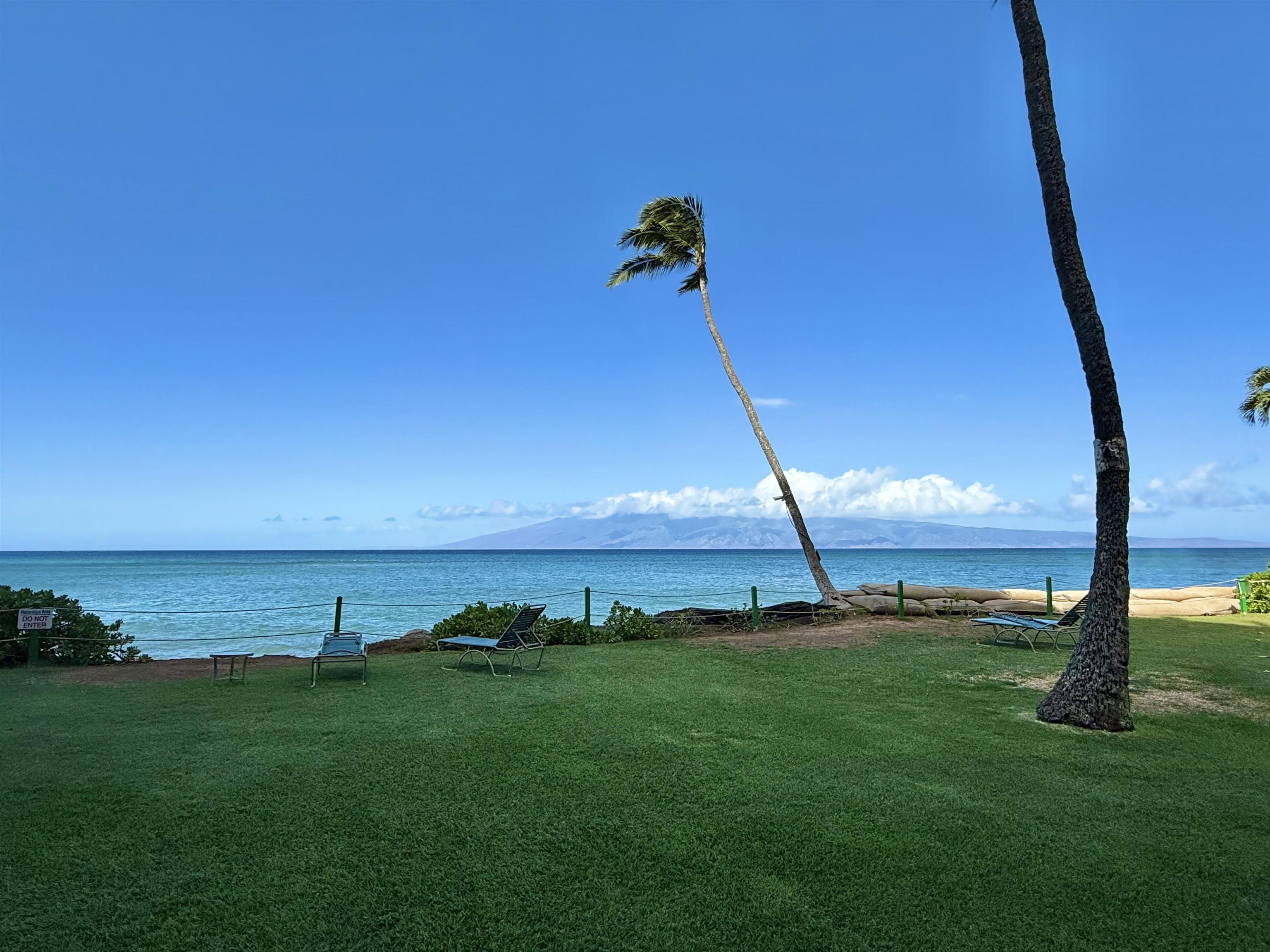 4365 Lower Honoapiilani Road, Unit 801 Lahaina, HI 96761 - Photo 24 of 24 a view of a big yard with a ocean view