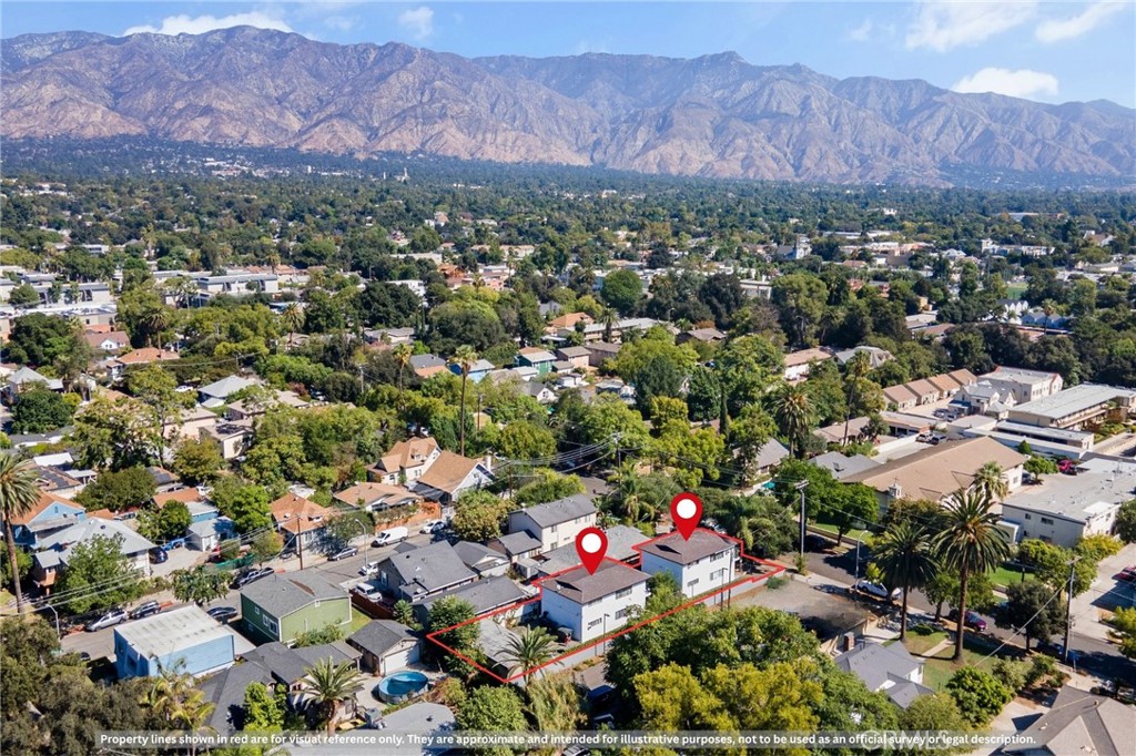 541 North Summit Avenue Pasadena, CA 91103 - Photo 2 of 13 an aerial view of residential house and sandy dunes