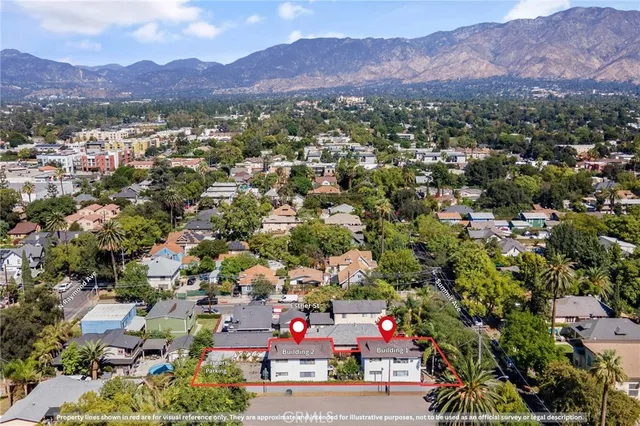 an aerial view of residential house with an outdoor space
