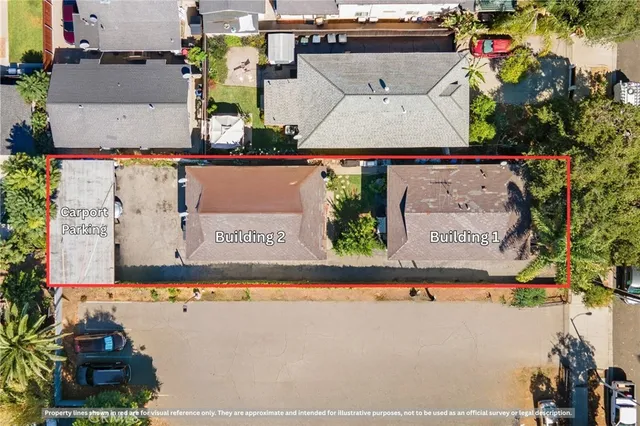 an aerial view of a house with a yard basket ball court and outdoor seating