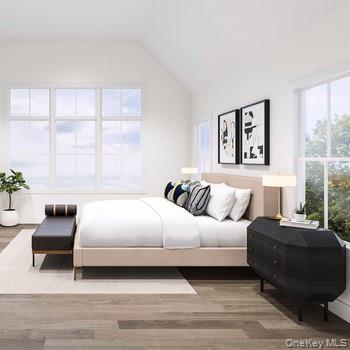 15 Marker Ridge, Unit 16 Irvington, NY 10533 - Photo 4 of 4 a bedroom with a bed and a couch