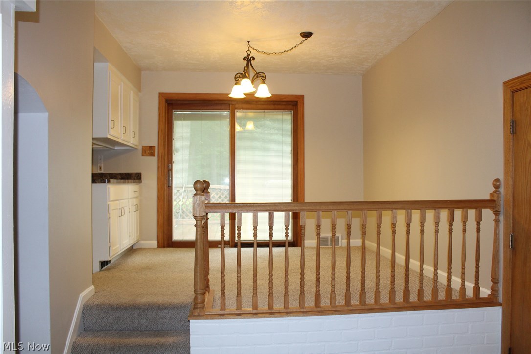 5807 East Sprague Road Independence, OH 44131 - Photo 11 of 33 Eat In Kitchen Area - Freshly painted and carpets were just cleaned. Easy access to the deck for your outdoor enjoyment