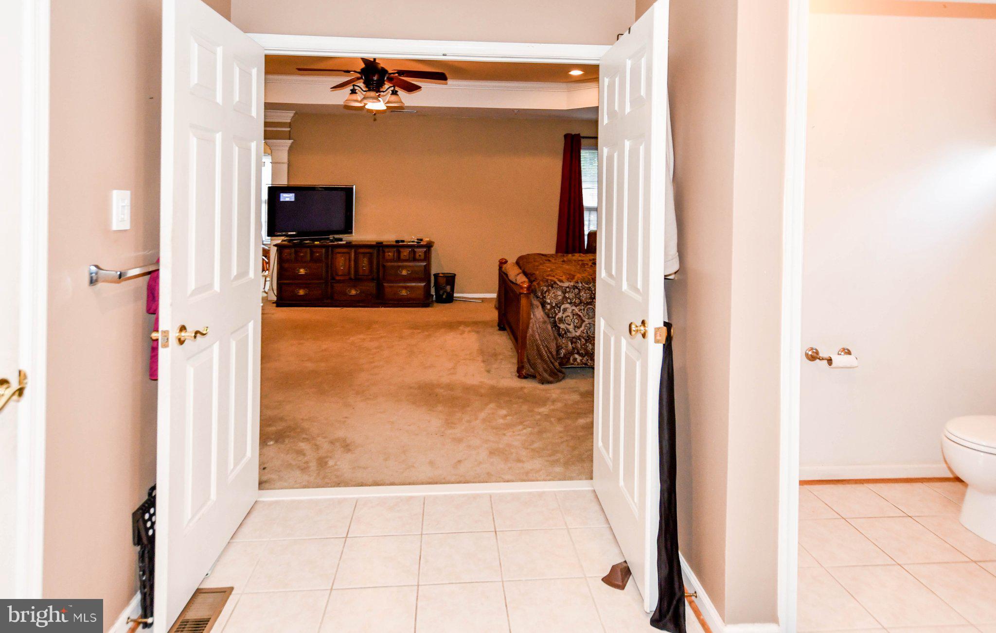 3208 Clavier Place Clinton, MD 20735 - Photo 52 of 55 Spacious entryway to cozy living area.
