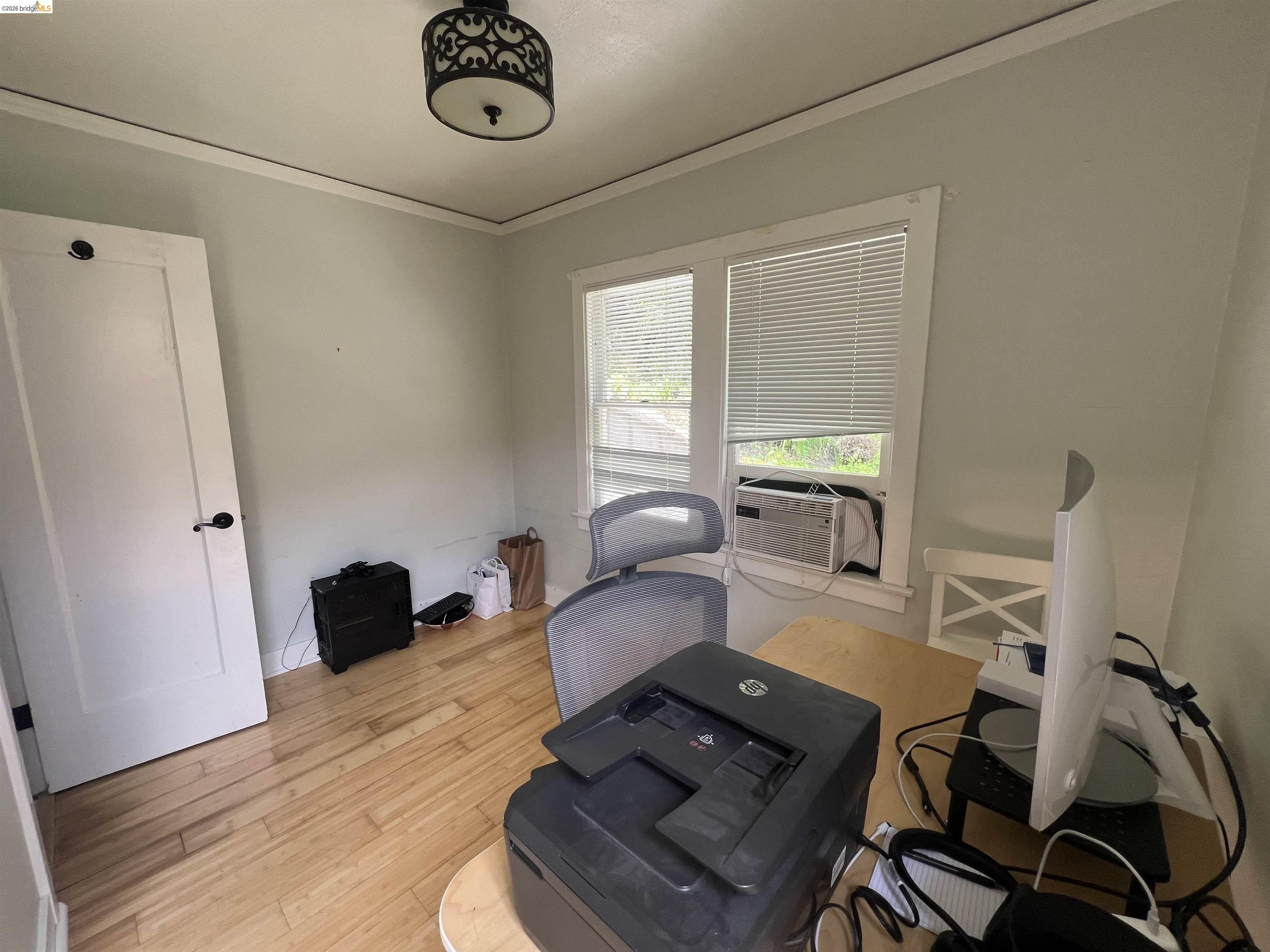 1631 La Vereda Road Berkeley, CA 94709 - Photo 42 of 42 Interior room with wood-finish flooring and light-toned walls