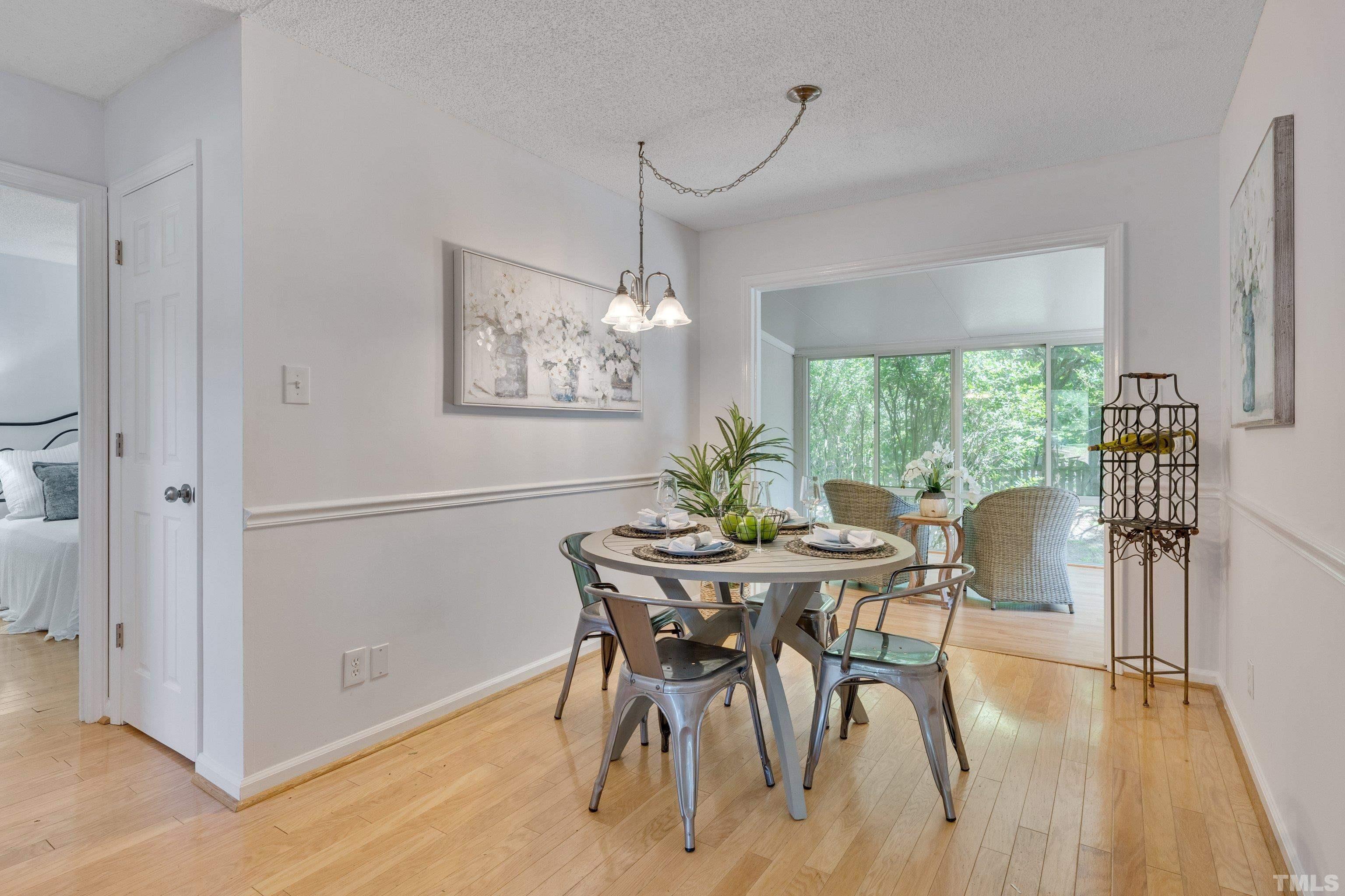 4101 Olde Coach Road Durham, NC 27707 - Photo 8 of 21 a view of a dining room with furniture window and outside view