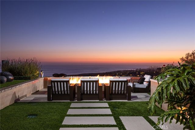 a view of a patio with a garden