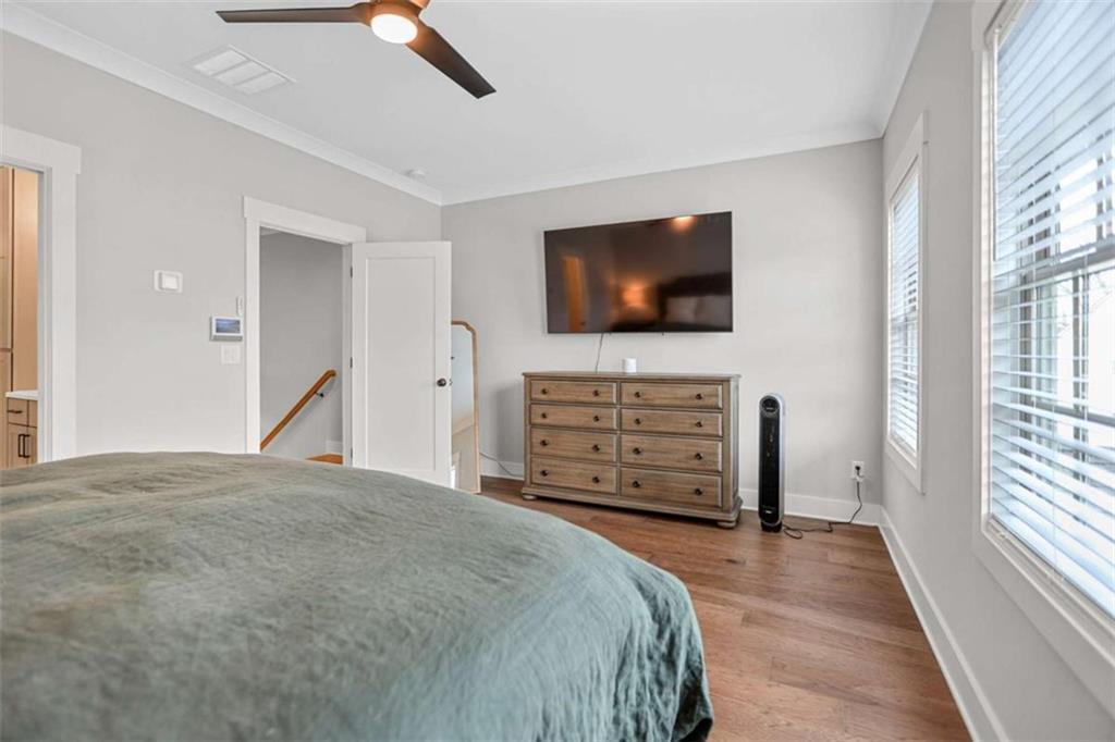 4466 Lemon Street Acworth, GA 30101 - Photo 45 of 65 a bedroom with a bed and a flat screen tv