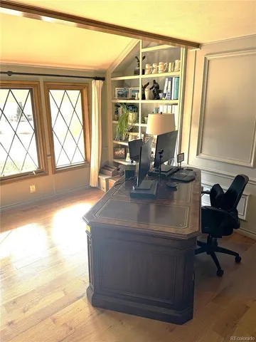 a view of a backyard with sitting area