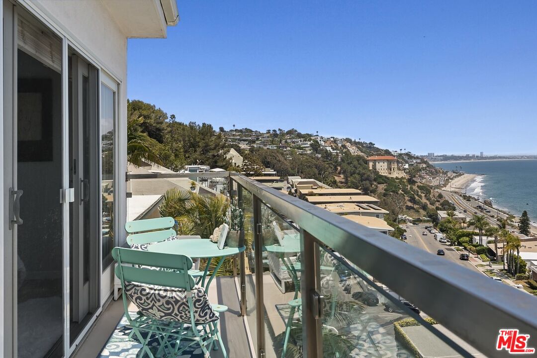 18147 Coastline Drive, Unit 3 Malibu, CA 90265 - Photo 19 of 40 a view of a balcony with an ocean view