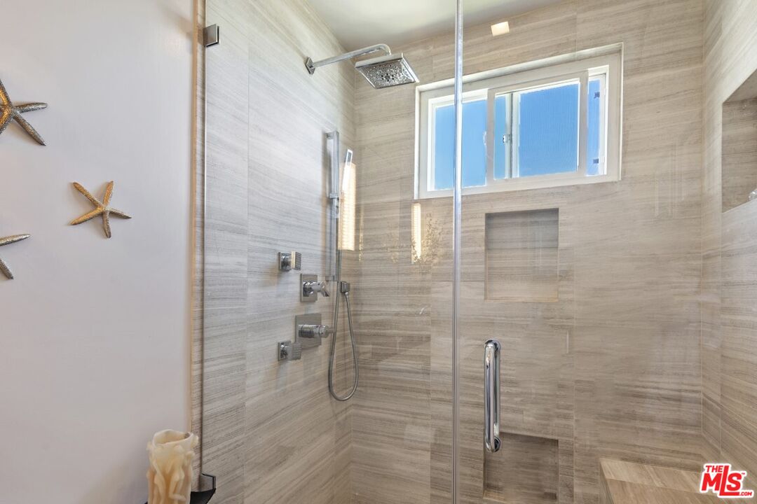 18147 Coastline Drive, Unit 3 Malibu, CA 90265 - Photo 24 of 40 a bathroom with a shower