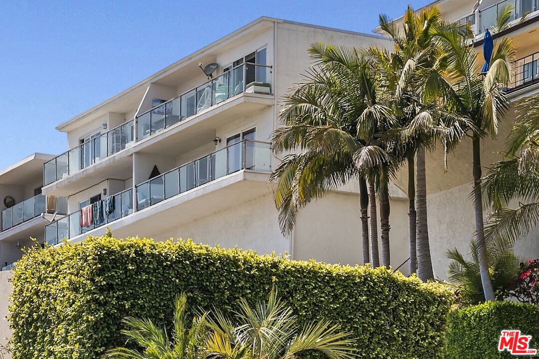 18147 Coastline Drive, Unit 3 Malibu, CA 90265 - Photo 34 of 40 a view of a house with a street