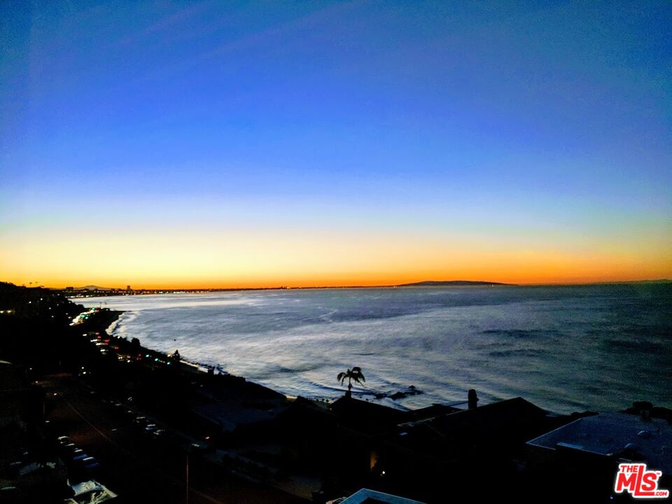 18147 Coastline Drive, Unit 3 Malibu, CA 90265 - Photo 38 of 40 a view of an ocean and beach