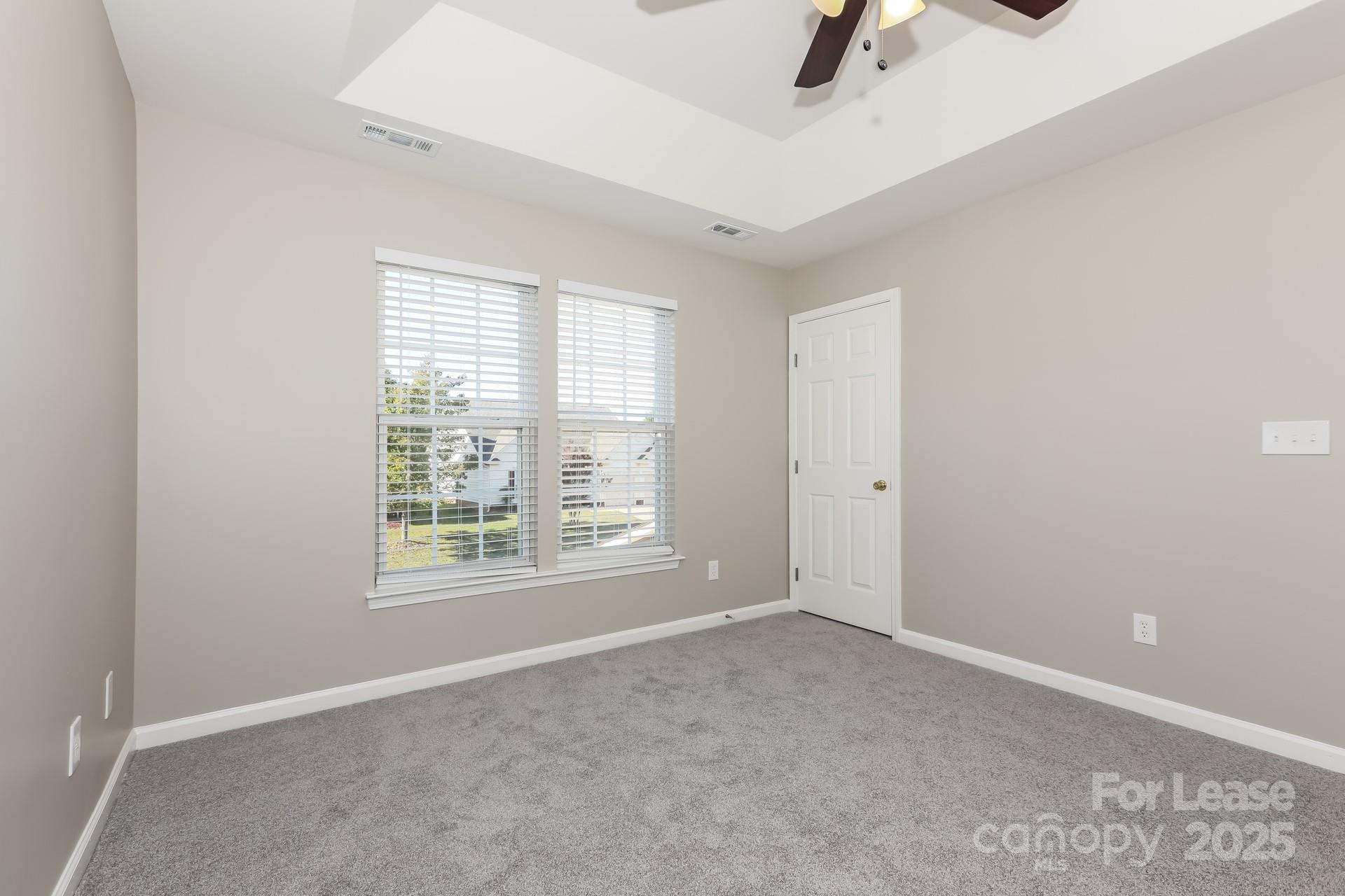 7037 Honey Tree Lane Indian Trail, NC 28079 - Photo 11 of 17 an empty room with windows