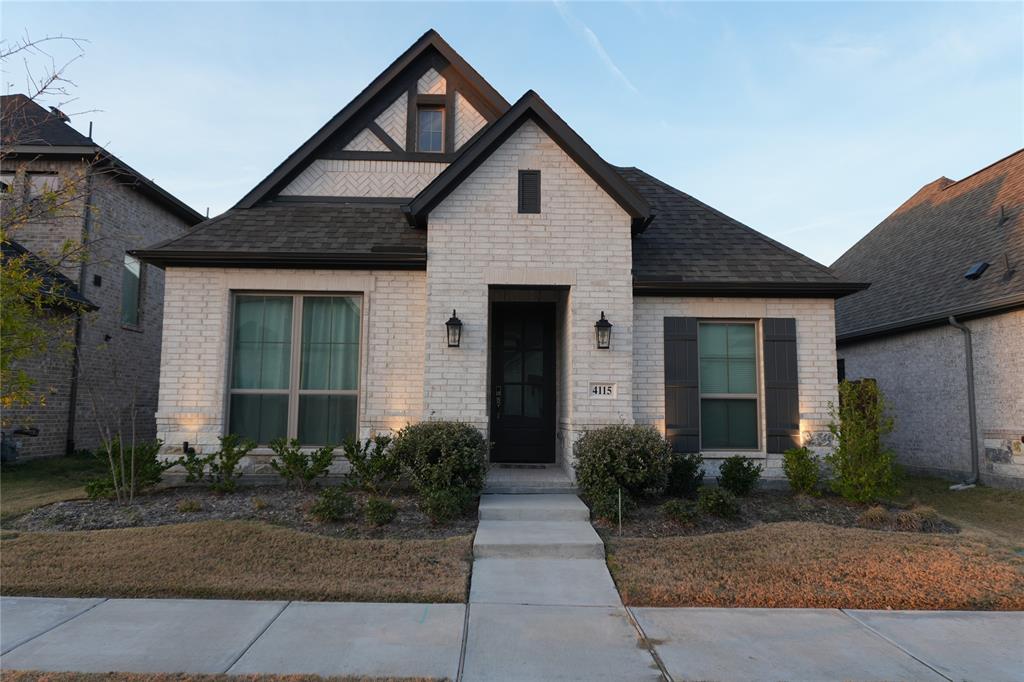 4115 Hudson Street Fate, TX 75087 - Photo 1 of 24 a front view of a house with garden