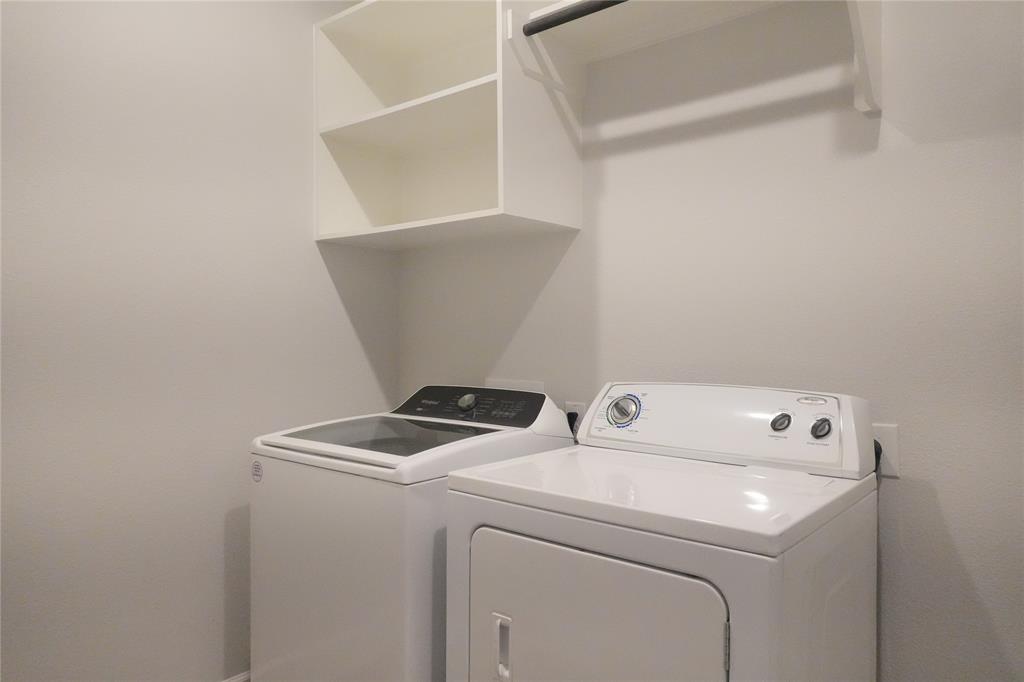 4115 Hudson Street Fate, TX 75087 - Photo 18 of 24 a utility room with dryer and washer