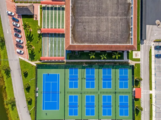 a front view of a house with a plants