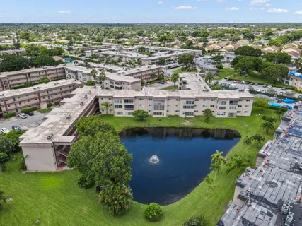 an aerial view of a house with a garden