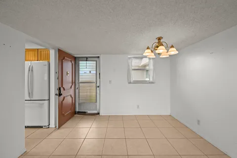 a view of a livingroom with a chandelier