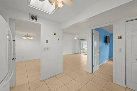 wooden floor with white walls