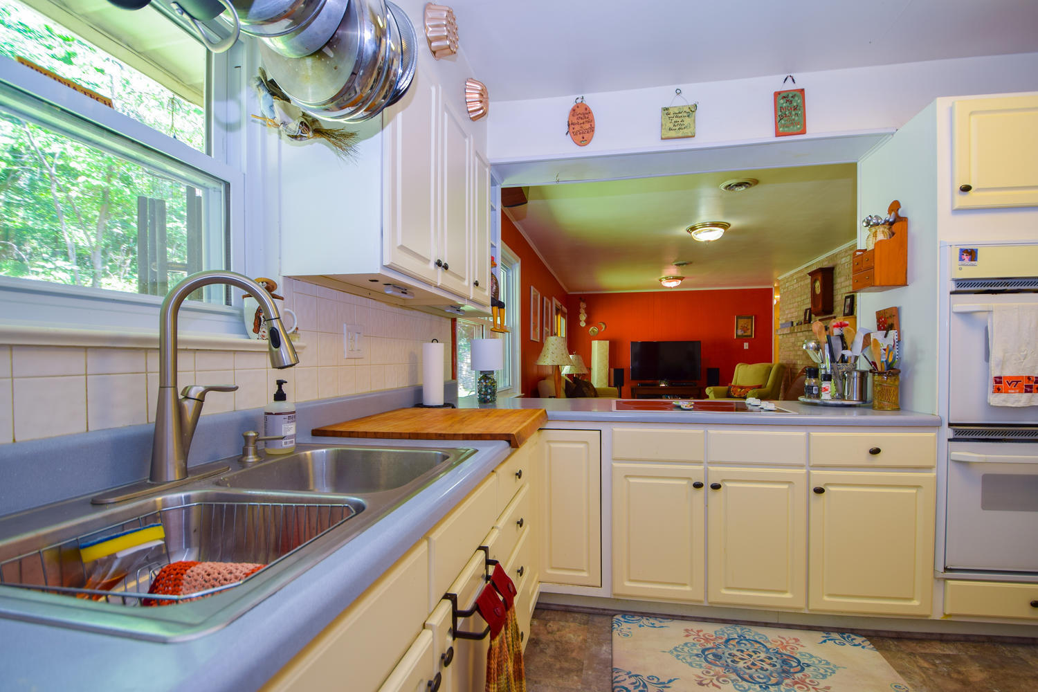 1638 Weaver Road Salem, VA 24153 - Photo 13 of 28 a kitchen with a sink a counter top space and cabinets