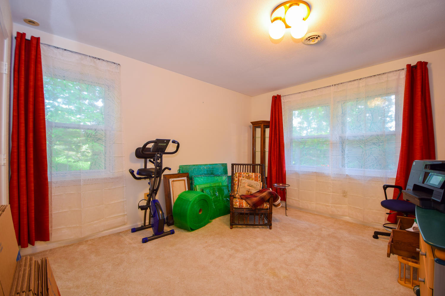 1638 Weaver Road Salem, VA 24153 - Photo 19 of 28 a room with gym equipment and a large window