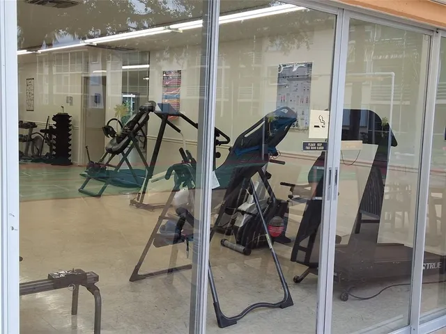 a view of a room with gym equipment