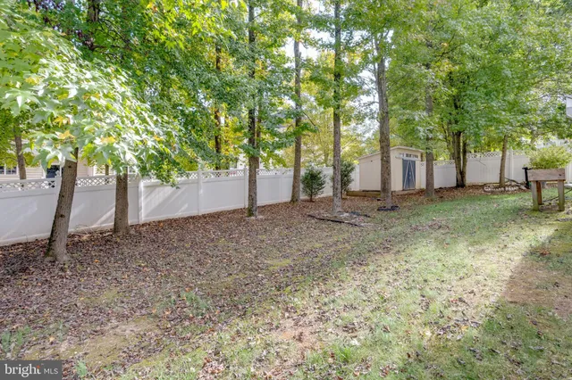 a room with furniture table and a window