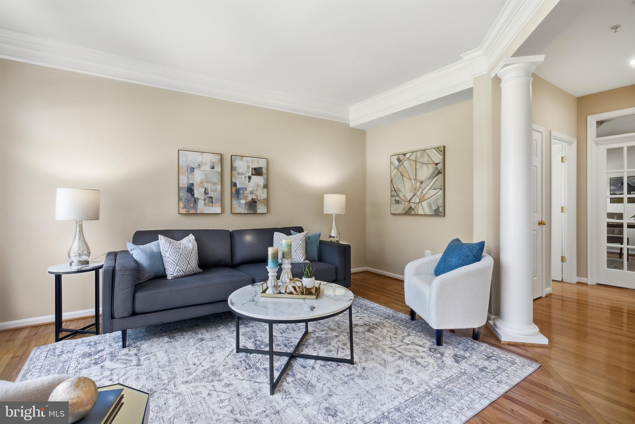 9013 Helmsley Drive Clinton, MD 20735 - Photo 18 of 68 a living room with furniture and wooden floor