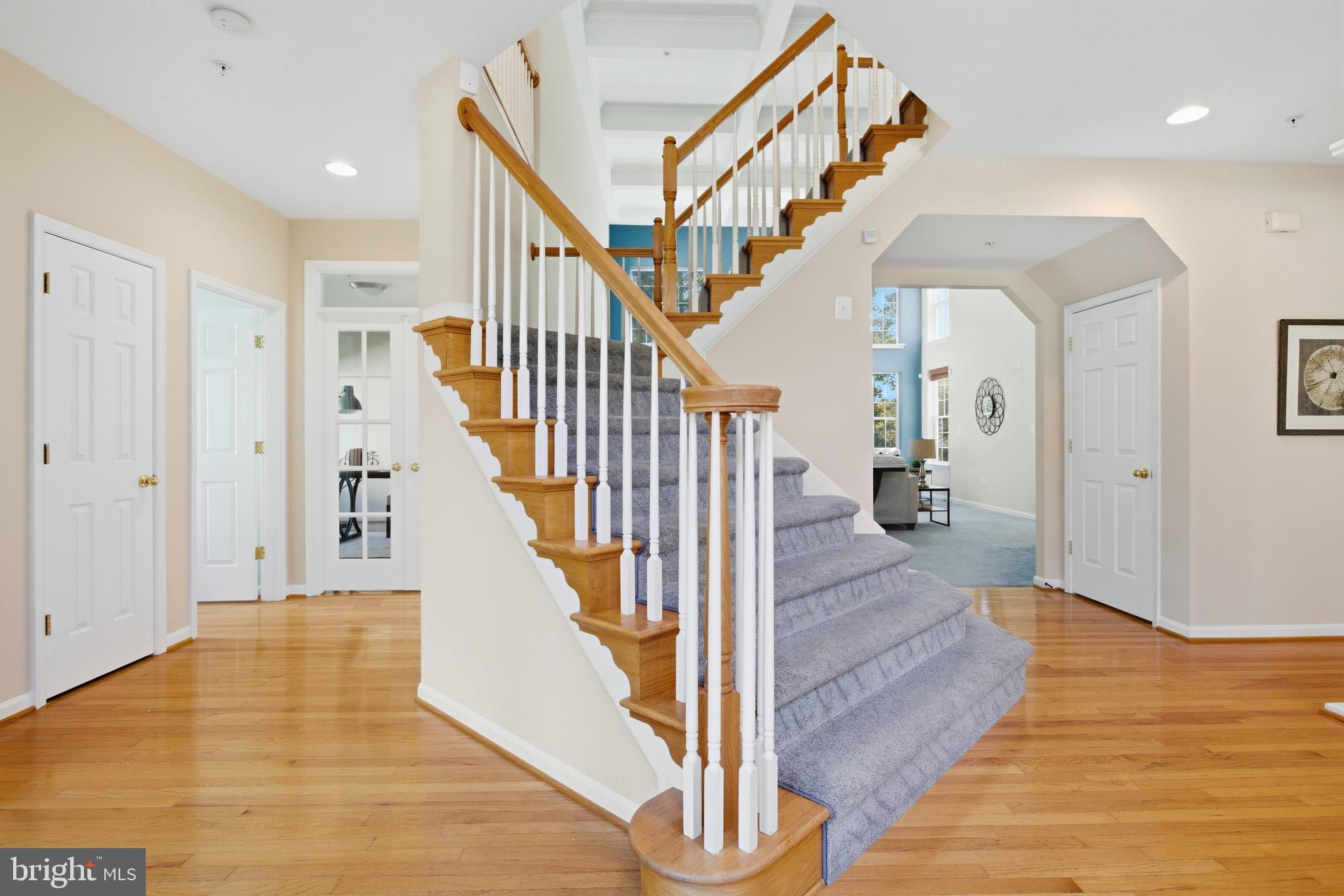 9013 Helmsley Drive Clinton, MD 20735 - Photo 19 of 68 a view of entryway and hall with wooden floor